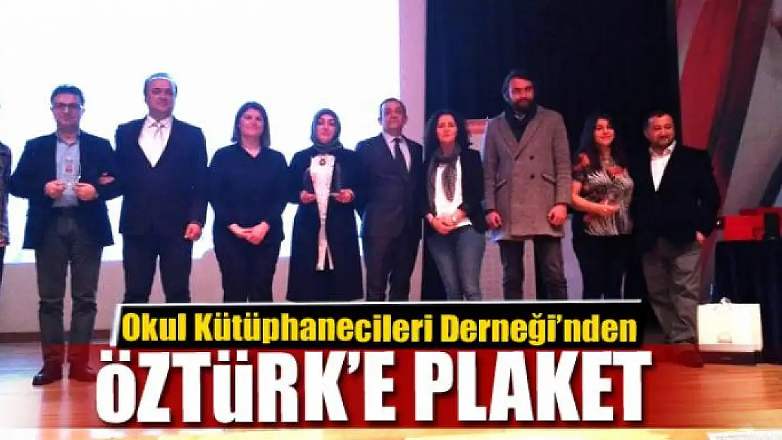 Okul Kütüphanecileri Derneği'nden Kaymakam Öztürk'e plaket 