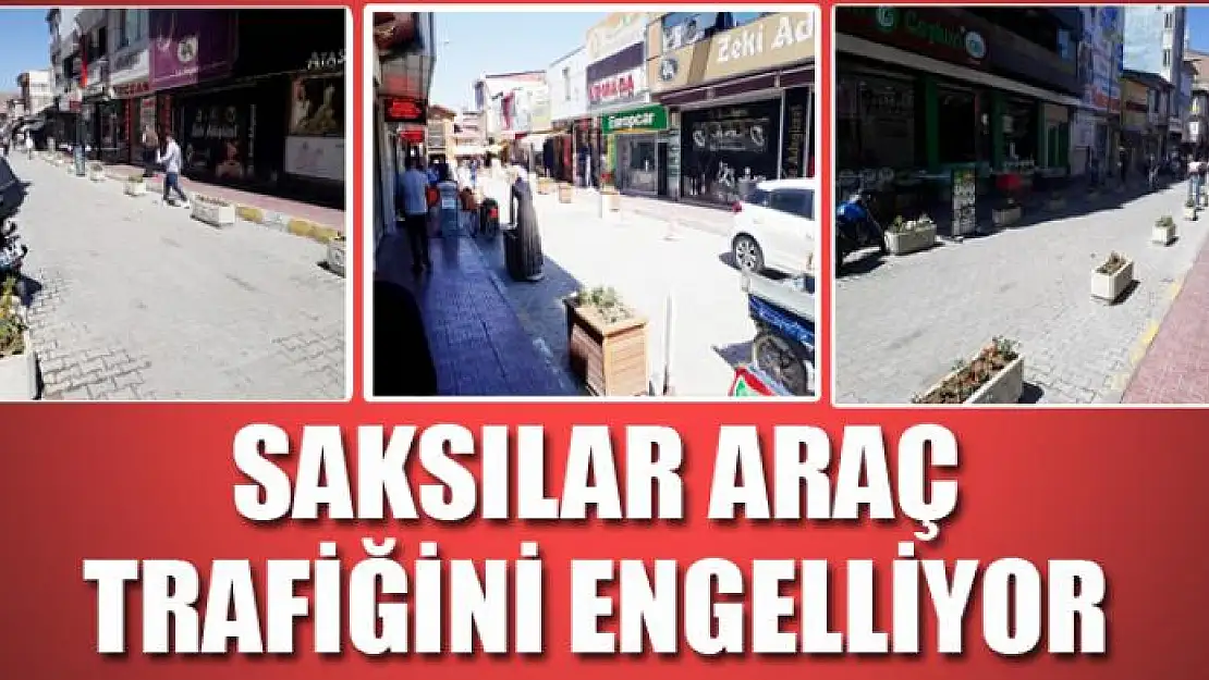 SAKSILAR ARAÇ TRAFİĞİNİ ENGELLİYOR