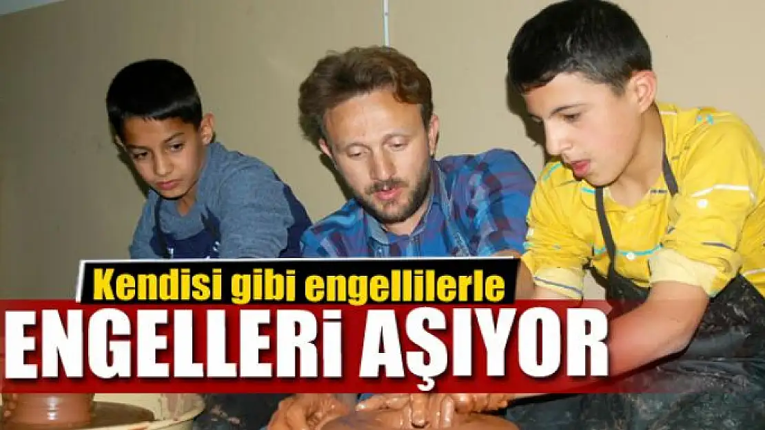 Kendisi gibi engellilerle engelleri aşıyor 