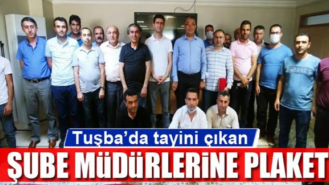 Tuşba'da tayini çıkan şube müdürlerine plaket