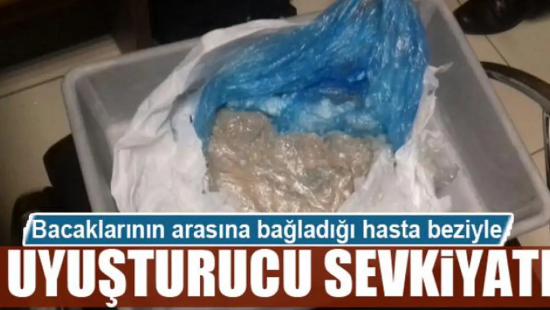 Bacaklarının arasına bağladığı hasta beziyle uyuşturucu sevkiyatı