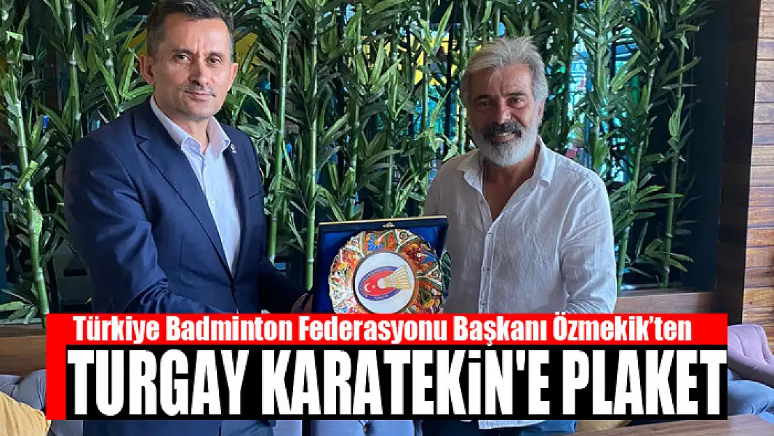 Başkan Özmekik'ten Turgay Karatekin'e plaket