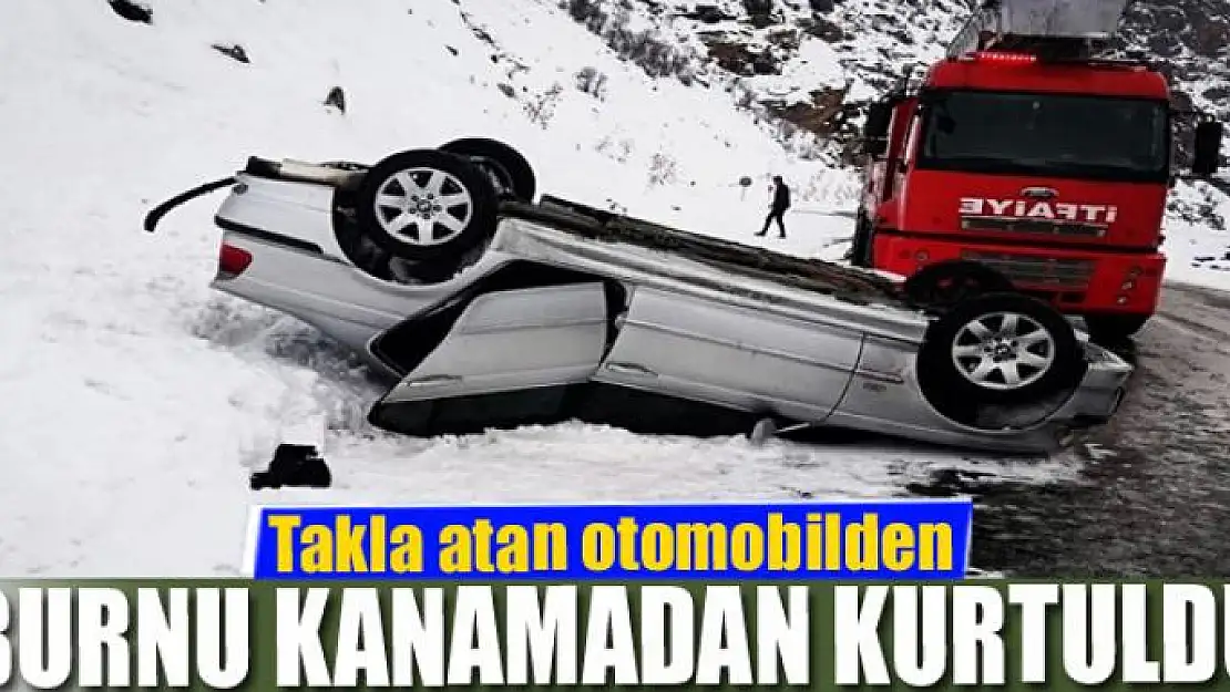 Takla atan otomobilden burnu kanamadan kurtuldu