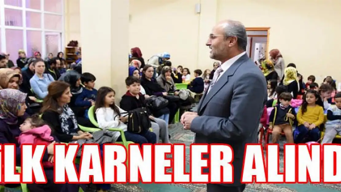 Minik öğrenciler ilk karnelerini aldı