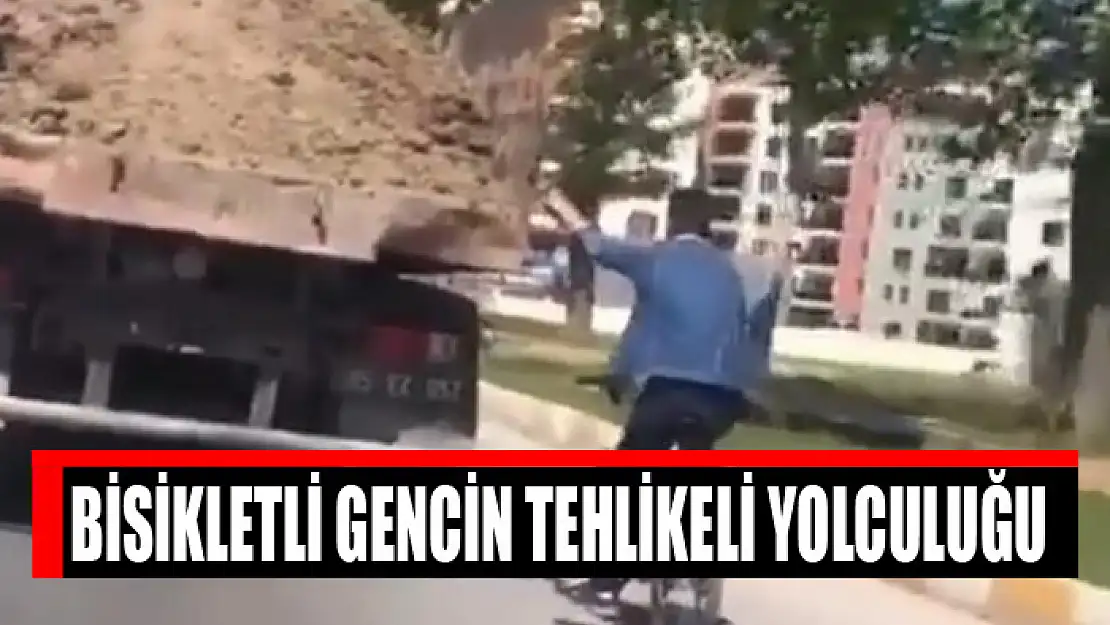 Bisikletli gencin tehlikeli yolculuğu