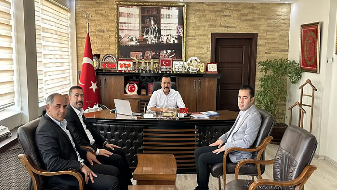 Kahraman'dan Türkmenoğlu'na ziyaret