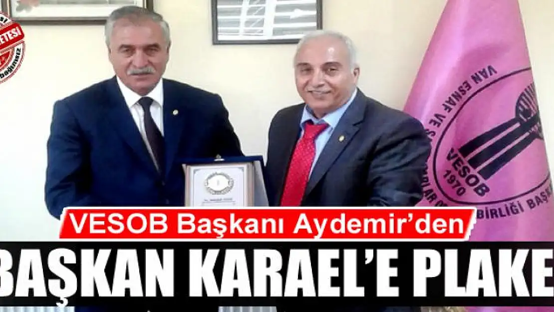 Başkan Karael'e plaket