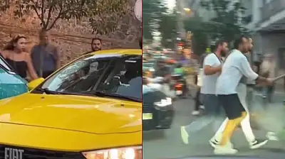 Dehşet anları: Sopayla kadının üzerine yürüdü