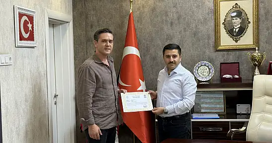 Kaymakam Bulut'tan tayin olan personele başarı belgesi