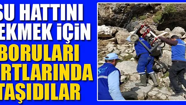 Su hattını çekmek için boruları sırtlarında taşıdılar