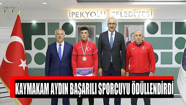 KAYMAKAM AYDIN BAŞARILI SPORCUYU ÖDÜLLENDİRDİ