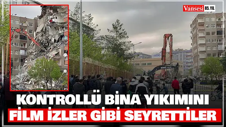 Kontrollü bina yıkımını film izler gibi seyrettiler