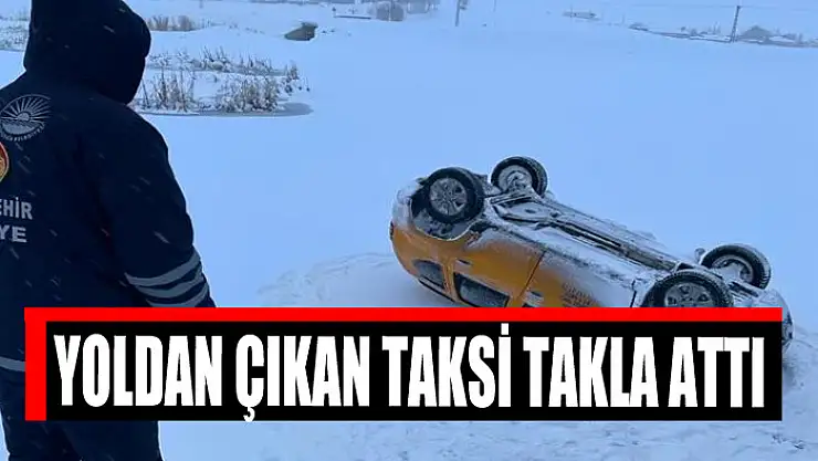 Yoldan çıkan taksi takla attı